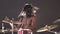 Energetic African drummer emotionally plays percussion instruments