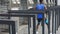 Energetic black man doing street workout in big metropolis, running exercises