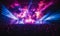 Energetic crowd enjoying a live concert with vibrant pink and blue stage lights at a music festival, capturing the essence of