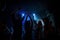 Energetic crowd. Group of people that enjoying dancing in the nightclub with beautiful lightings