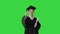 Energetic female graduate walking with diploma and giving motivating speech on a Green Screen, Chroma Key.