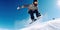 Energetic Guy Snowboarding Down Snow-Covered Peaks - Generative AI