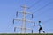 Energetic runner on the under electricity pylon