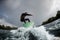 Energetic sports man jumps on wave with his surfboard.