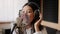 Energetic Young Asian Female Vocalist Singing In Microphone In Music Studio