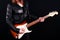 Energetic Young Woman Rocking Out on Electric Guitar in Studio - Powerful Musician Performing