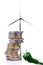 Energy Cost Concept With Coin Tower, Wind Turbine And Electricity Plug