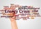 Energy crisis word cloud and hand with marker concept