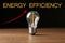 Energy efficiency concept. Vintage filament lamp bulb on table
