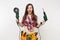 Energy handyman woman in gloves, noise insulated headphones, kit tools belt full of instruments holding power saw