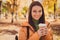 Energy pause. Photo of charming cute lady smiling hold cup drink visit coffee shop make break between university classes