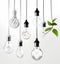 Energy saving eco lamps, made with green leaves with sketches. LED lamp with green leaf. Minimal nature concept. Think