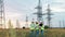 Energy workers are discussing a project near transmission towers