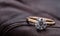 Engagement Diamond Ring on Leather Background