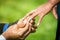 Engagement ring proposal hands close up