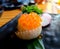 Engawa Sushi Roll topped with Salmon roe. Japanese food