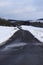 Engeln, Germany - 01 26 2021: badly deteriorated country road in the snowy Eifel