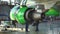 Engine and chassis of the passenger airplane under heavy maintenance. Engineer checks the aircraft engine.