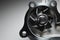 Engine coolant pump. New spare part on a contrasting gradient background for car services
