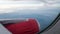 The engine cowling of airplane on the beautiful cloudy and sky