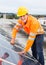 Engineer Adjusting Solar Panels