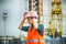 Engineer or Architect checking personal protective equipment safety helmet at construction site