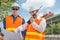 Engineer and Architect or Foreman wear white hardhat and Glow sa