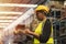 Engineer black women worker, Professional woman afican mechanical maintenance work in factory checking stock inventory in