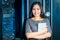 Engineer businesswoman in network server room