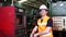 Engineer checking and controlling automatic machine in the industry. Maintenance technicians and engineers are checking the machin