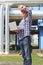 Engineer in hardhat with laptop