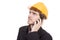 Engineer holding a cellphone with a yellow helmet