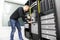 IT engineer installs blade server in datacenter