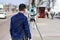 Engineer land surveyor makes measurements on the street of the city of Chernigov, Ukraine