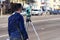 Engineer land surveyor makes measurements on the street of the city of Chernigov, Ukraine, April 2018