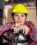 Engineer Leaning On Steering Wheel Of Forklift