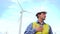 Engineer looking for a loss near wind turbines ecological energy industry power windmill