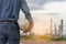 Engineer man hands holding hardhat white work helmet hard hat for Civil Construction Engineering. Construction engineer man in