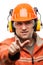 Engineer or manual worker man in safety hardhat helmet white iso