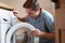 Engineer Mending Domestic Washing Machine