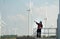 Engineer at Natural Energy Wind Turbine site with a mission to climb up to the wind turbine blades to inspect the operation of