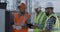 Engineer showing power transformer to inspectors