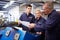 Engineer Teaching Apprentices To Use Tube Bending Machine