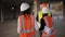 The engineer and two women inspector conduct an inspection and bypass the construction site.