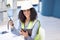 Engineer, walkie talkie and tablet with a black woman working in logistics, construction or engineering using technology