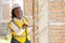 Engineer women black african professional worker working inspection quality check of construction site house building project