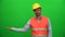 Engineer Worker Lifting Or Presenting Something on Green Screen