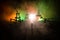 Engineering man standing against beautiful dusky sky of oil refinery plant. Silhouette of a man standing on the road at the