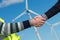 Engineers Handshake, Wind Turbine Power Station