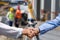 Engineers shaking hands on construction site